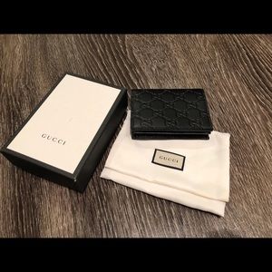 Gucci GG Black leather bi fold Wallet